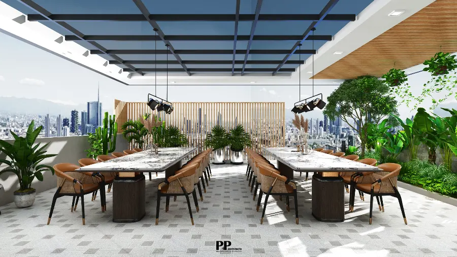 Cách chọn vật liệu xanh trong thiết kế villa bền vững, sang trọng 2026 4 Khu vực bàn ăn ngoài trời trong villa xanh với cây xanh và vật liệu bền vững