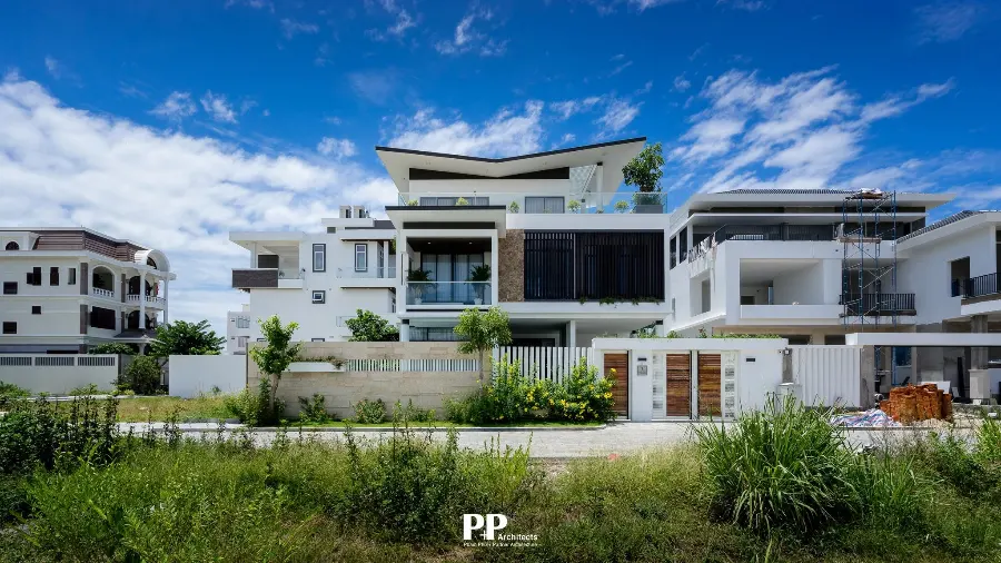 Thiết kế kiến trúc biệt thự Nha Trang và 6 chi tiết tạo nên không gian sống có chiều sâu 5 Thiết kế kiến trúc biệt thự Nha Trang với mặt tiền trắng hiện đại và mảng xanh