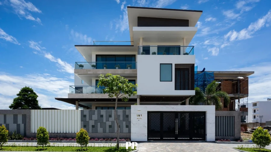 Villa Net Zero với mặt tiền biệt thự hiện đại và mảng xanh ban công