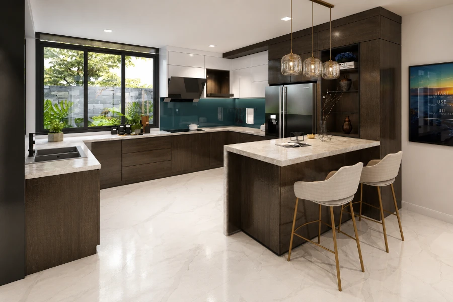 Dịch vụ thiết kế villa Nha Trang với không gian bếp hiện đại, bàn đảo đá và cửa kính nhìn ra sân vườn