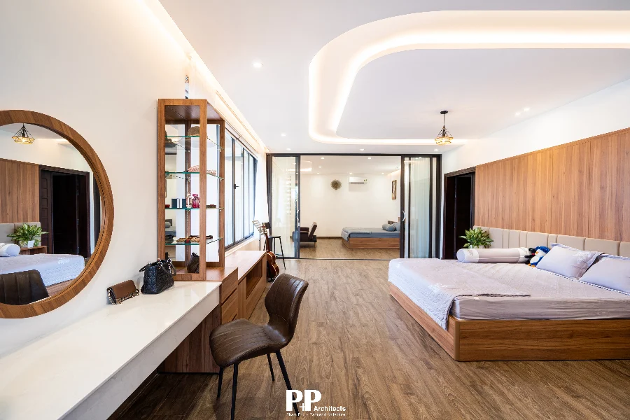 Thiết kế kiến trúc villa Nha Trang: 5 giải pháp tạo nên không gian biệt thự có chiều sâu 8 Thiết kế kiến trúc villa Nha Trang với phòng ngủ rộng và nội thất gỗ ấm