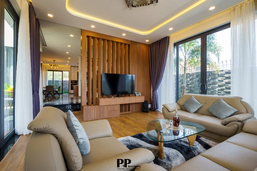 Công ty thiết kế biệt thự Nha Trang uy tín: 5 tiêu chí gia chủ nên quan tâm trước khi lựa chọn 7 Công ty thiết kế biệt thự Nha Trang uy tín với phòng khách kết nối cảnh quan bên ngoài