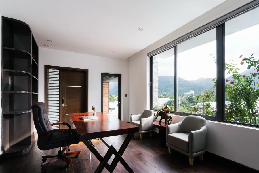 Công Ty Thiết Kế Biệt Thự Xanh Nha Trang 2026: Khi Kiến Trúc Trở Thành Một Phần Của Đời Sống Gần Thiên Nhiên 9 Công ty thiết kế biệt thự xanh Nha Trang với phòng làm việc đón sáng và tầm nhìn hướng núi